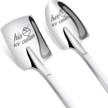 Two silver stainless steel spoons, one engraved 'His' and the other 'Hers', side by side on a clean background.