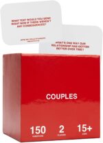 WE'RE NOT REALLY STRANGERS Couples Edition card game box with scattered conversation cards