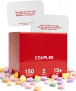 WE'RE NOT REALLY STRANGERS Couples Edition card game box with scattered conversation cards